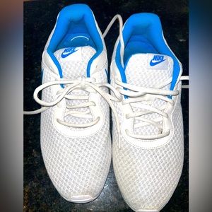 Nike mens white and blue athletic shoes. Size 9.5 very good condition.